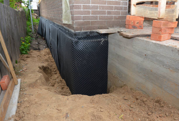 Happy homeowners after waterproofing job in Staunton